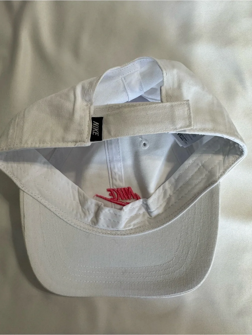 Nike White Baseball Cap with Pink Logo